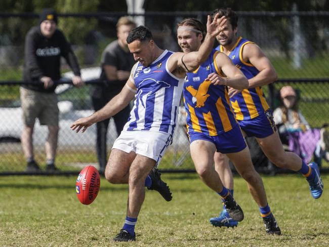 Langy’s Blake Peach takes a kick. Picture: Valeriu Campan