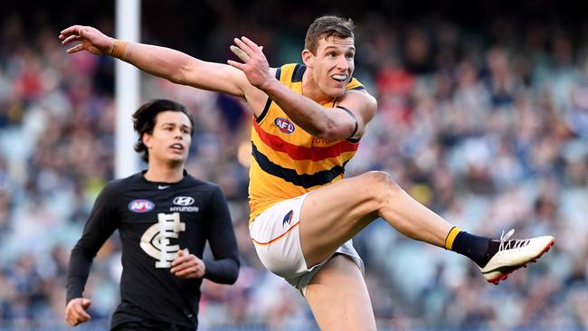 Josh Jenkins kicks a vital goal in the last quarter, during his team’s clash with Carlton. Picture: Joe Castro (AAP)