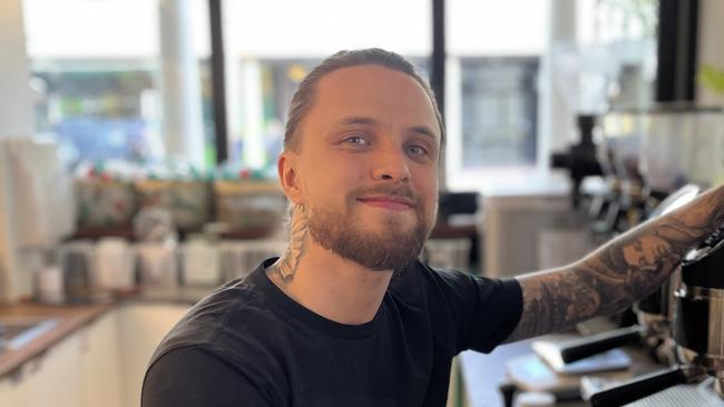 "Getting leave in hospitality is quite difficult". Barista Taliesin Morgan said while he supported the scheme, he thinks it would only assist a minority of hospitality workers. Picture: Julia Kanapathippillai