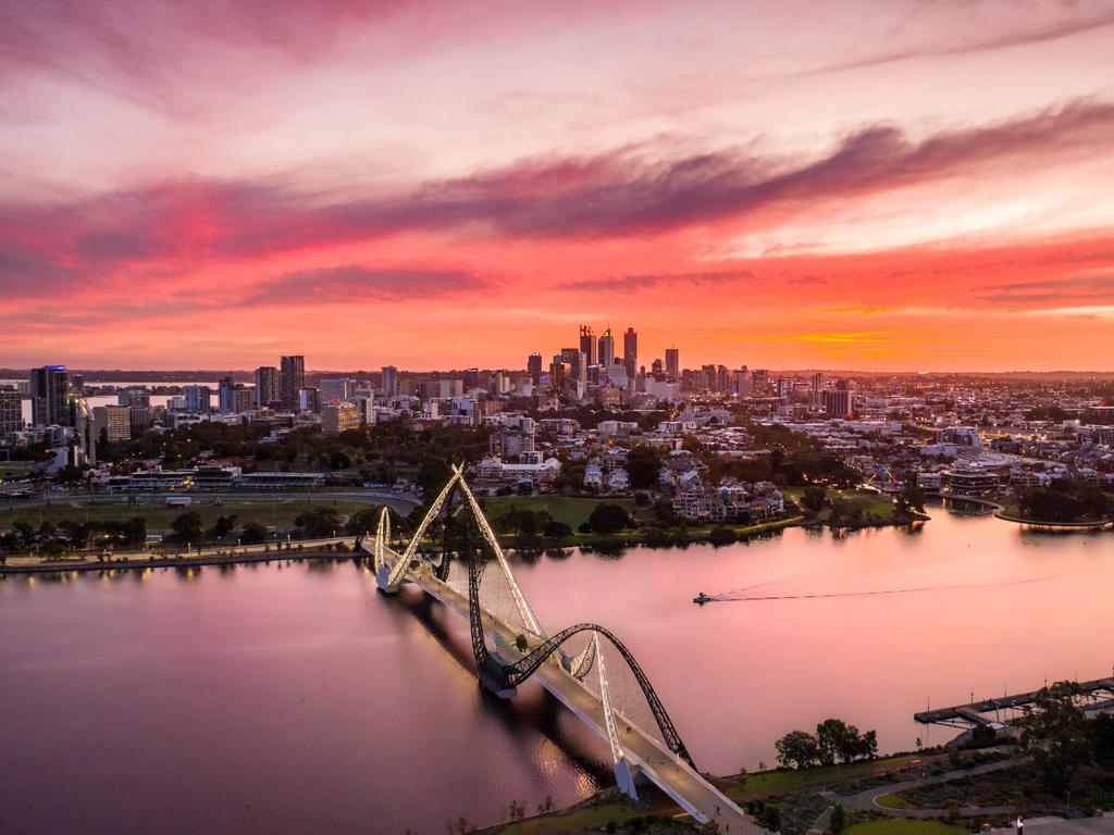 An aerial View of the sun rising above Matagarup Bridge, Perth. Picture: Tourism WA