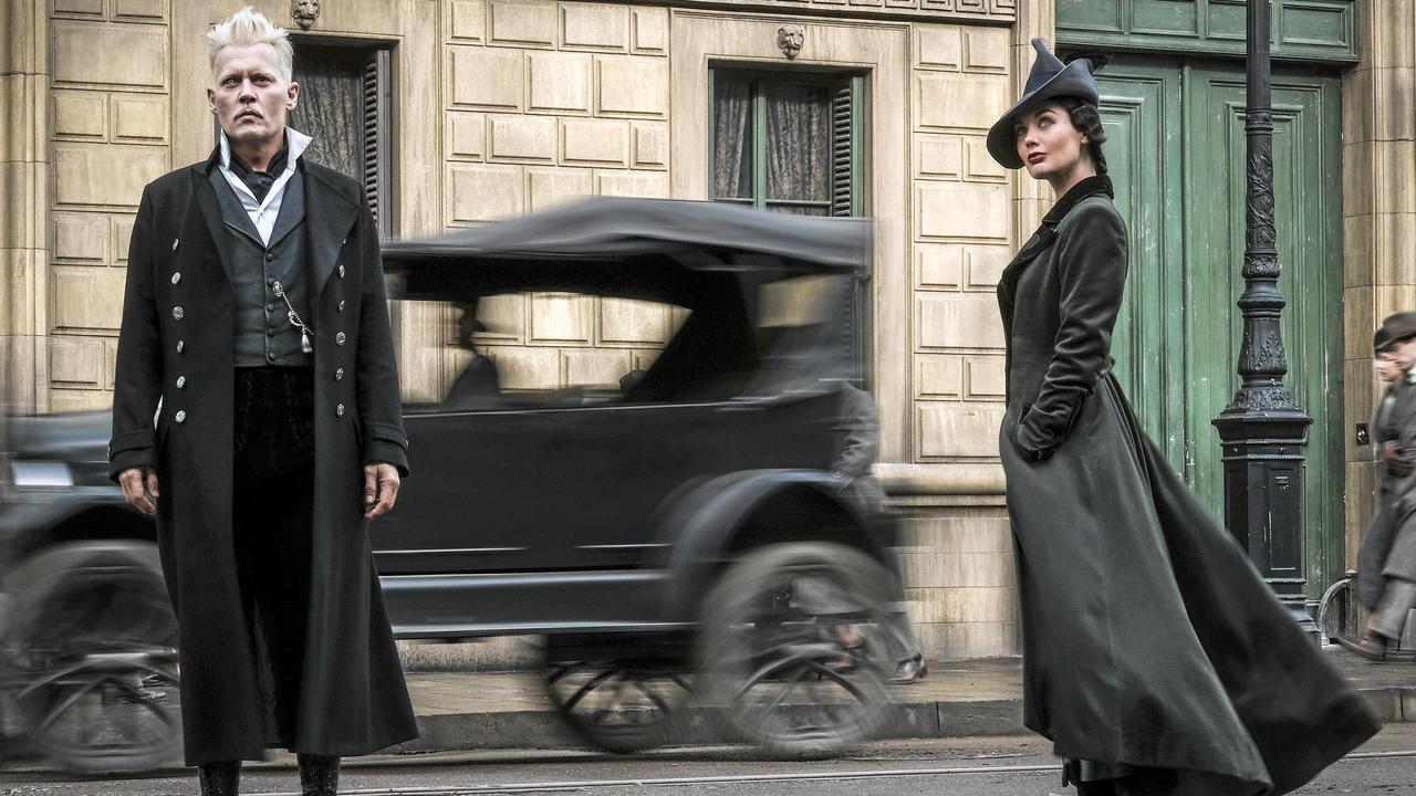 Johnny Depp and Poppy Corby-Tuech in a scene from the movie <i>Fantastic Beasts: The Crimes of Grindelwald</i>. Picture: Jaap Buitendijk.