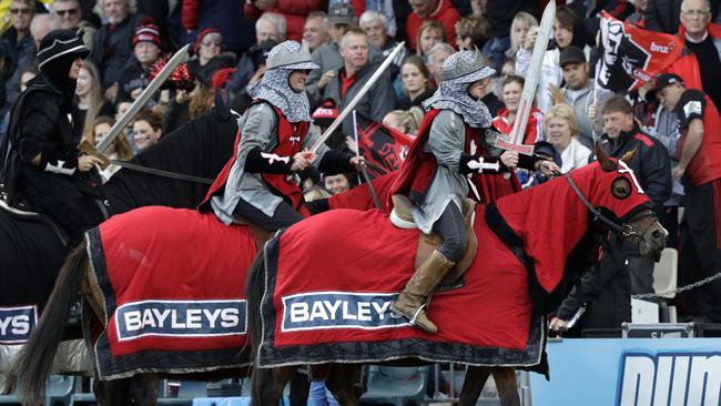 In this Feb. 23, 2019, photo, the Crusader horseman ride around the arena prior to the start of the Super Rugby match between the Crusaders and Hurricanes in Christchurch, New Zealand. The Crusaders announced Wednesday, April 3, 2019, that they will be considering a change to their name and branding following the Christchurch terrorist attacks on March 15 - insisting the status quo is 'no longer tenable." (AP Photo/Mark Baker)