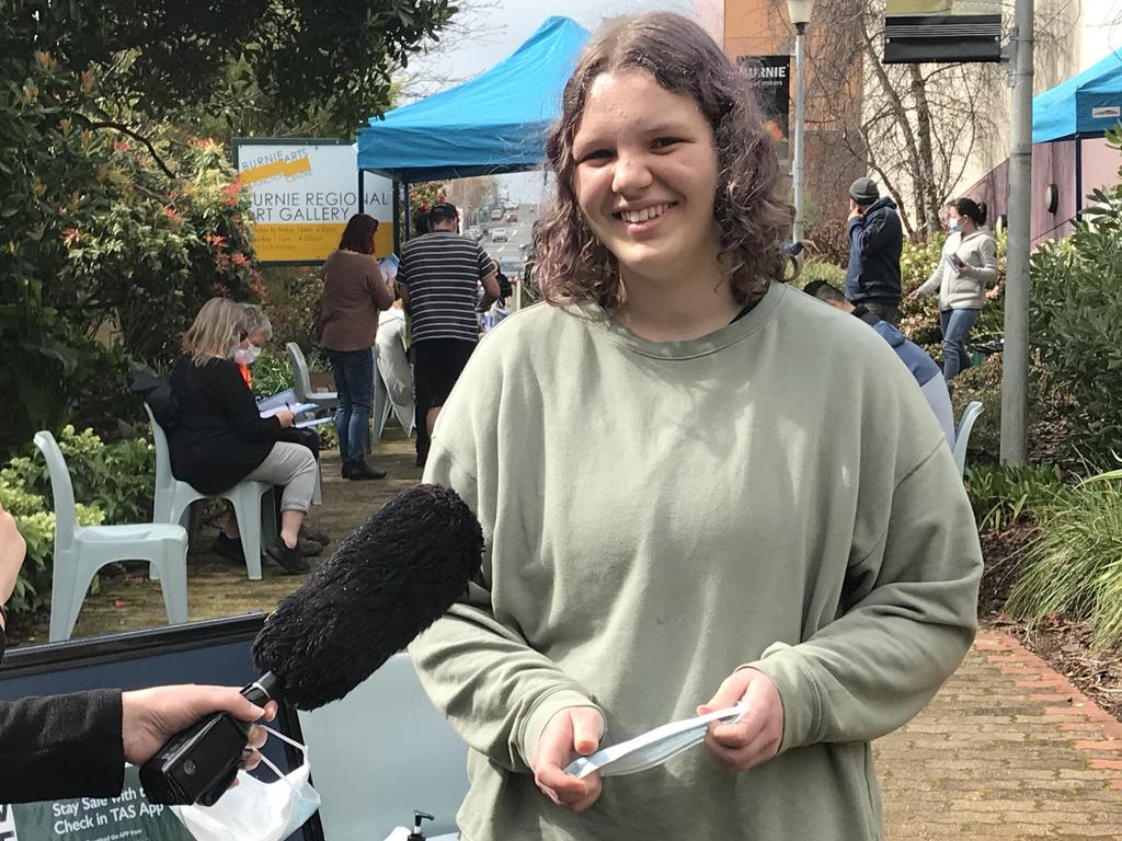 Isabella Dobson lines up for her first dose of the Pfizer vaccine in Burnie.