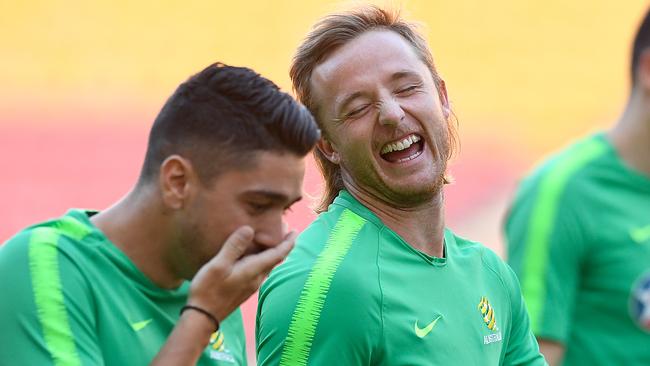 Rhyan Grant enjoys a laugh at Socceroos training. Picture: AAP 