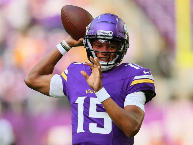 MINNEAPOLIS, MINNESOTA - NOVEMBER 12: Joshua Dobbs #15 of the Minnesota Vikings warms up before the game against the New Orleans Saints at U.S. Bank Stadium on November 12, 2023 in Minneapolis, Minnesota. (Photo by Adam Bettcher/Getty Images)