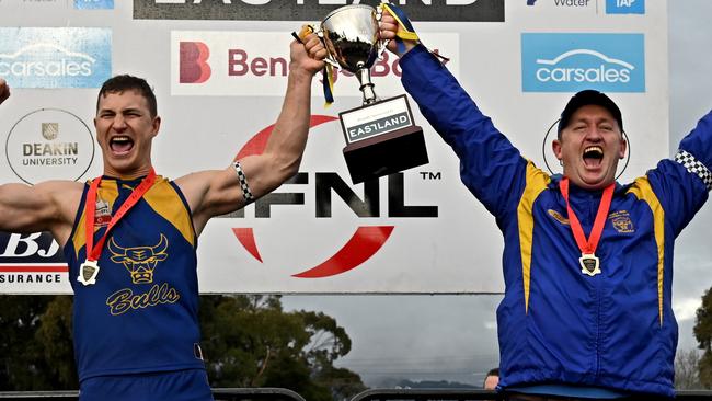 Noble Park captain Kyle Martin and coach Steve Hughes celebrate after winning the EFL Premier Division Grand Final between Rowville and Noble Park in Melbourne, Saturday, Sept. 17, 2022. Picture: Andy Brownbill