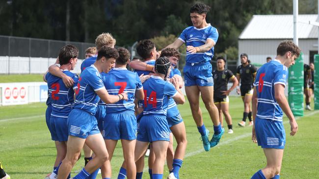 St Dominic's College celebrate a try against Bass High. Picture: Tim Hunter