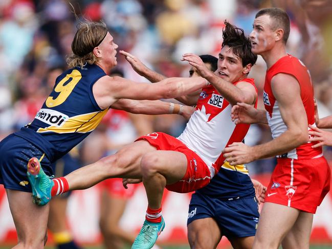 Young Eagle Harley Reid dishes it out to Errol Gulden. Picture: Dylan Burns/AFL Photos