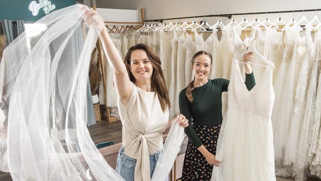 Lizzi Meyer (left) and Kate Meyer are part of Three Sisters Bridal Boutique team. Picture: Nev Madsen.