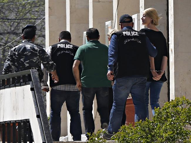 Police ... escort Sally Faulkner, the mother of the al-Amin children, and Tara Brown to Lebanon's Baabda Prison for women. Picture: Getty.