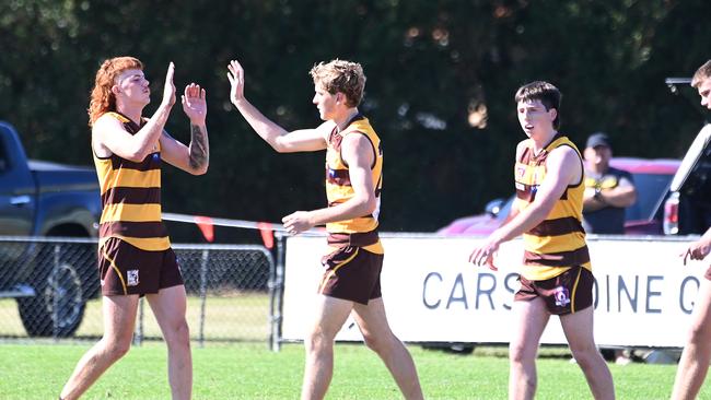 Aspley players celebrate a goal Redland-Victoria Point v Aspley in QAFL colts Saturday August 12, 2023. Picture, John Gass