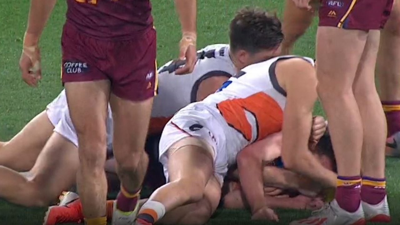 Toby Greene appears to grab at the face of Lachie Neale in this incident.