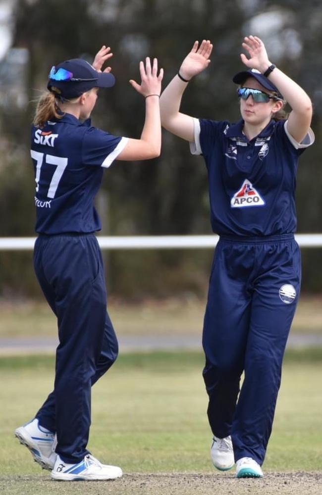 Annie Taylor and Eve Righetti celebrate a wicket for Geelong. Picture: Wes Cusworth