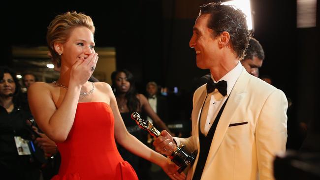 Winners ... Actress Jennifer Lawrence and Best Actor Award winner Matthew McConaughey backstage during the Oscars. Picture: Christopher Polk (Getty Images)