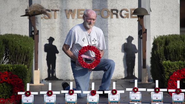 Mic Noble poses for a photograph at the Logan war memorial, Thursday April 16, 2020. The service has been cancelled but he will be organising a video tribute. (AAP/Image Sarah Marshall)