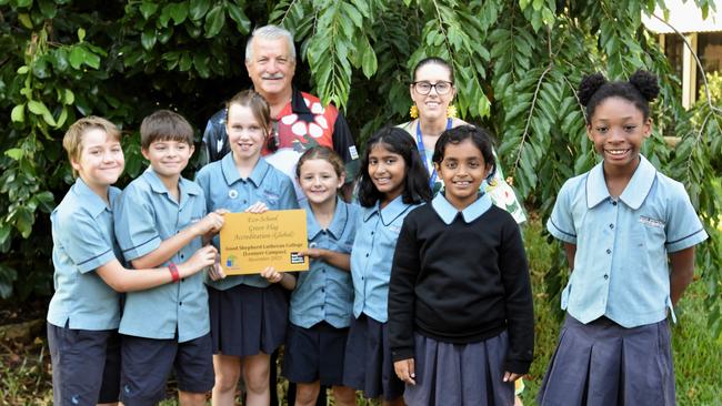 Good Shepherd Lutheran College Leanyer's eco-committee alongside Keep Australia Beautiful Council NT CEO Heimo Schober and eco-schools coordinator Angele Beukes.