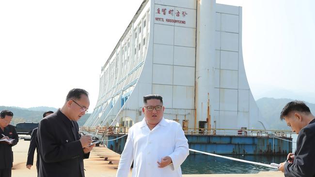 An unimpressed North Korean leader Kim Jong-un outside the floating hotel on October 23. Picture: STR/KCNA via KNS/AFP