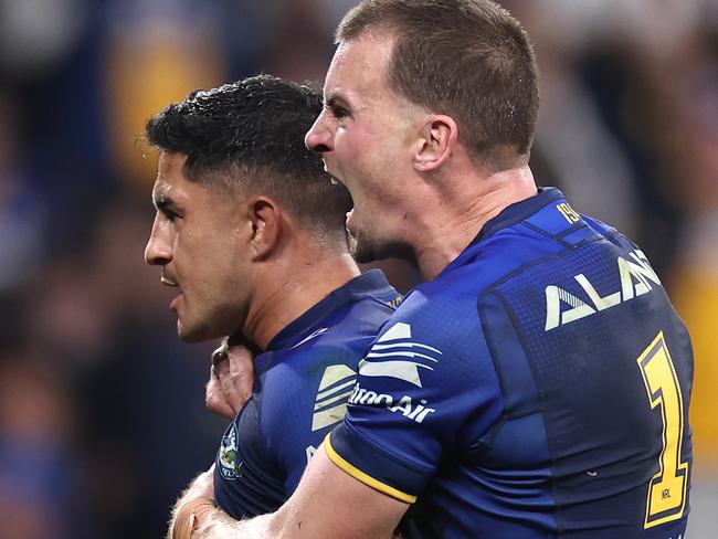 SYDNEY, AUSTRALIA - MAY 30:  Dylan Brown of the Eels celebrates with Clint Gutherson after scoring a try during the round 13 NRL match between Parramatta Eels and Cronulla Sharks at CommBank Stadium on May 30, 2024, in Sydney, Australia. (Photo by Cameron Spencer/Getty Images)