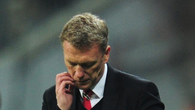 MUNICH, GERMANY - APRIL 09: David Moyes, manager of Manchester United looks dejected during the UEFA Champions League Quarter Final second leg match between FC Bayern Muenchen and Manchester United at Allianz Arena on April 9, 2014 in Munich, Germany. (Photo by Shaun Botterill/Getty Images)