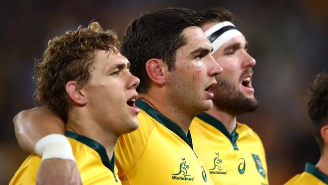 BRISBANE, AUSTRALIA - SEPTEMBER 08: Rob Simmons of the Wallabies and team mates sing the Australian national anthem during The Rugby Championship match between the Australian Wallabies and the South Africa Springboks at Suncorp Stadium on September 8, 2018 in Brisbane, Australia.  (Photo by Cameron Spencer/Getty Images)