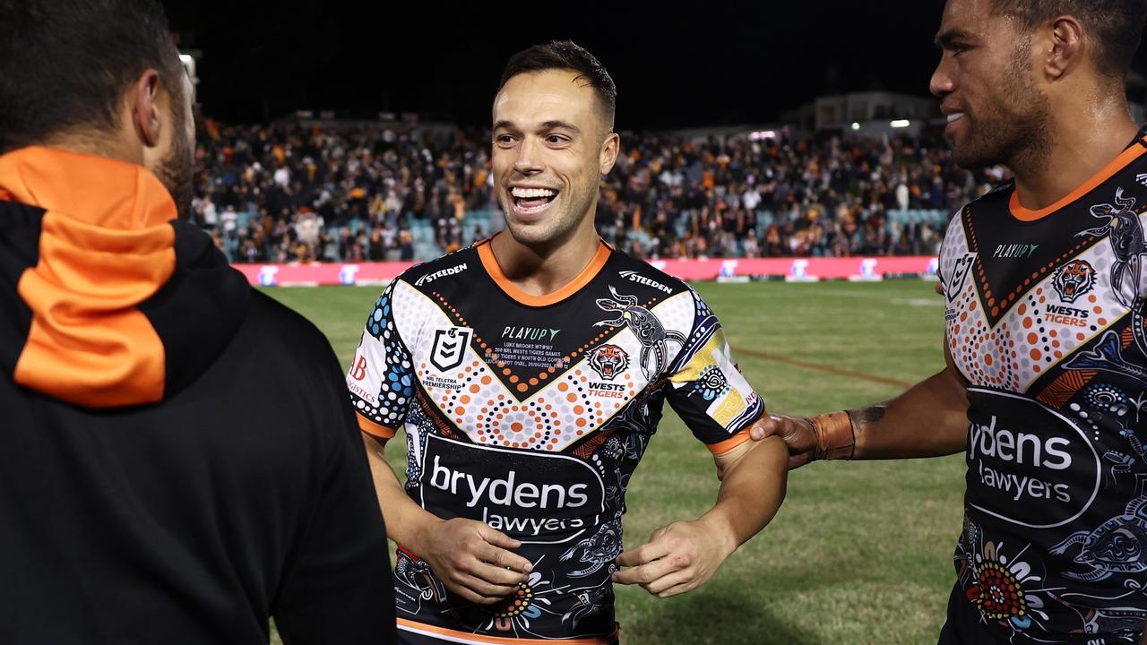 SYDNEY, AUSTRALIA - MAY 20: Luke Brooks of the Tigers celebrates victory with teammates after the round 12 NRL match between Wests Tigers and North Queensland Cowboys at Leichhardt Oval on May 20, 2023 in Sydney, Australia. (Photo by Matt King/Getty Images)