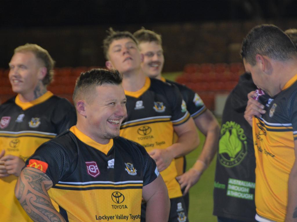 Gatton's halfback Regan Wilde chatting to a teammate after the win.