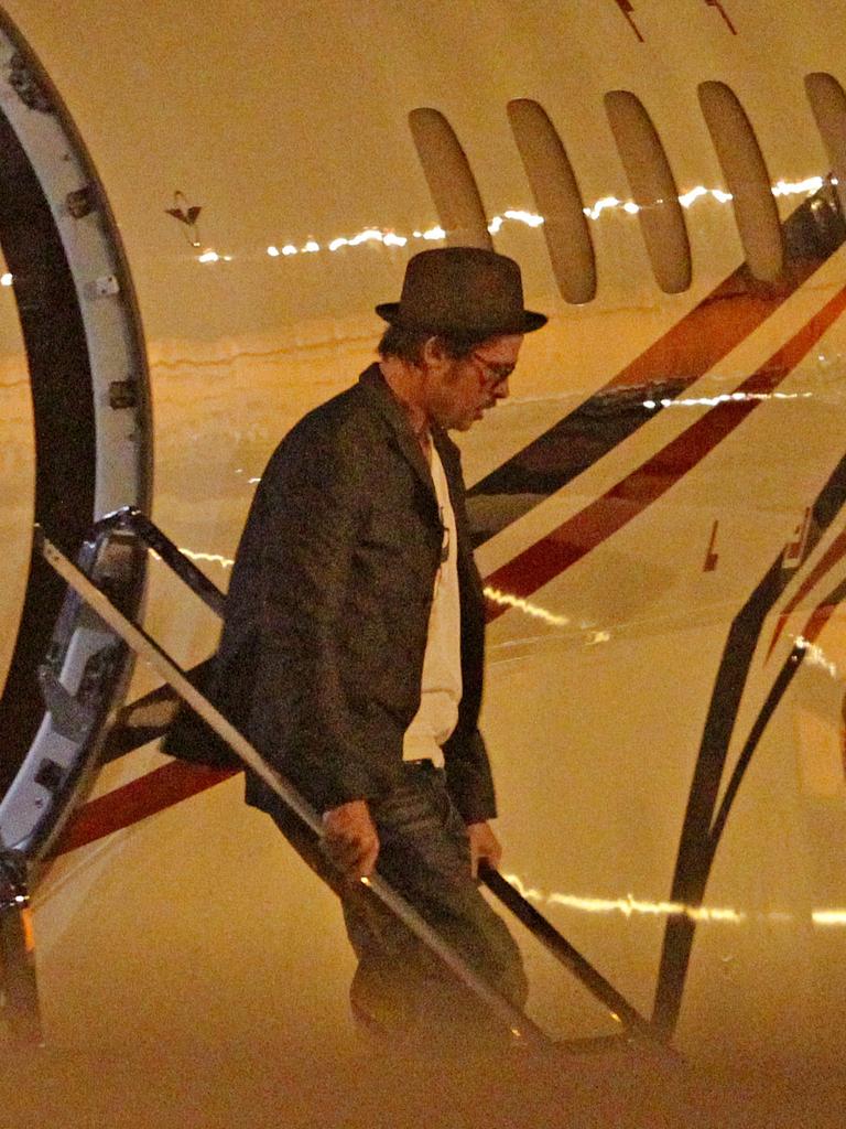 Pitt disembarks a private jet after his honeymoon back in 2014. Picture: Splash News/Media Mode
