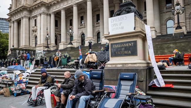 Protesters camp out at parliament to protest the Bill. Picture: Jake Nowakowski