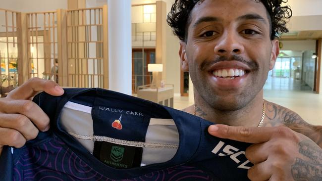 Josh Addo-Carr shows the logo dedicated to his grandfather under the jersey’s collar. Picture: Supplied