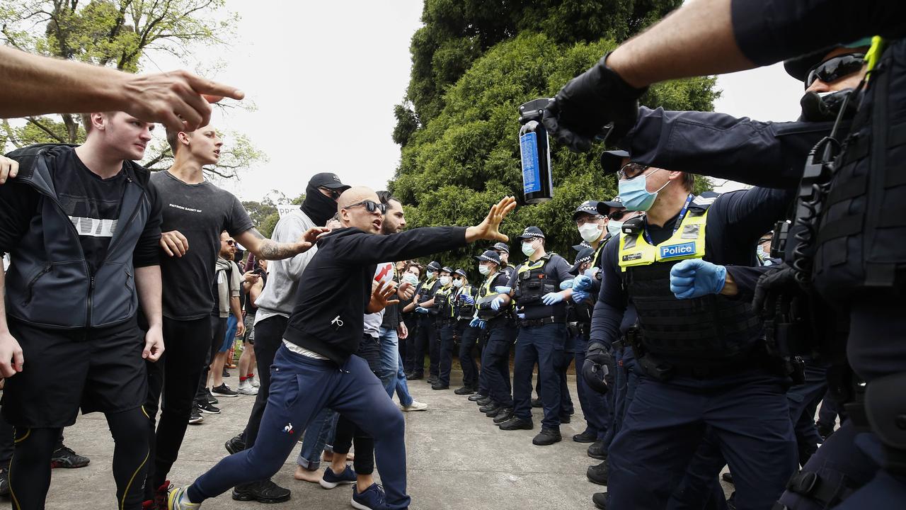 Protesters square off with police at an anti-lockdown protest at the Shrine of Remembrance in Melbourne on Friday. Picture: NCA NewsWire / Daniel Pockett