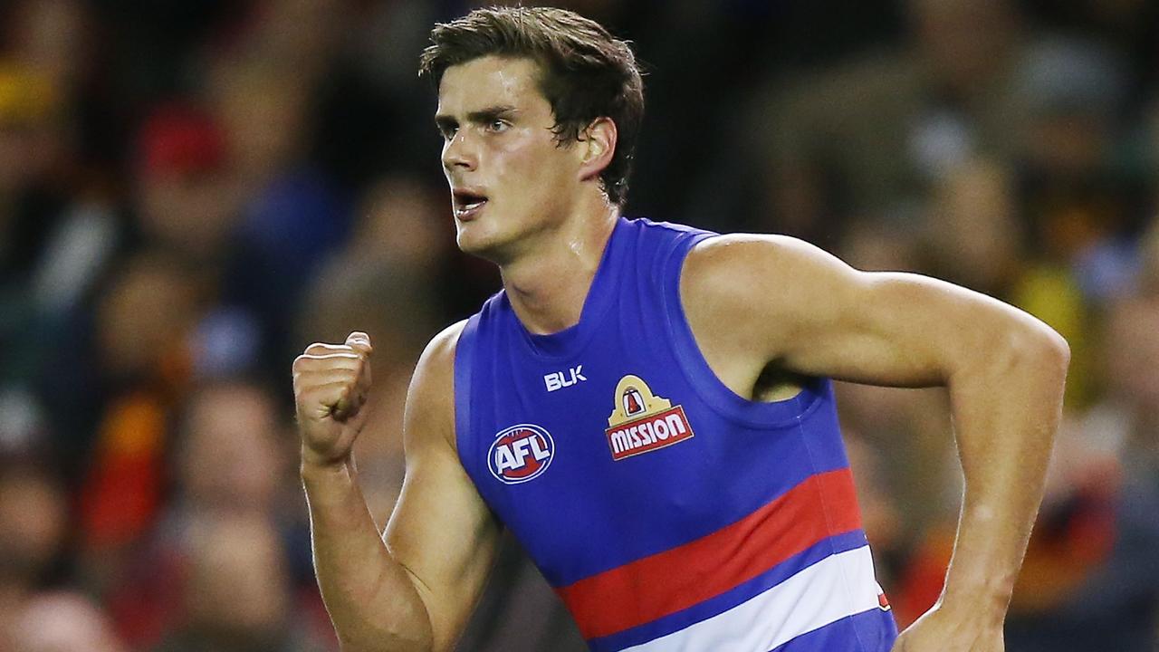 MELBOURNE, AUSTRALIA - APRIL 26: Tom Boyd of the Bulldogs celebrates a goal during the round four AFL match between the Western Bulldogs and the Adelaide Crows at Etihad Stadium on April 26, 2015 in Melbourne, Australia. (Photo by Michael Dodge/Getty Images)