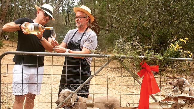 Neale and partner David enjoying the company of their two Weimaraners.