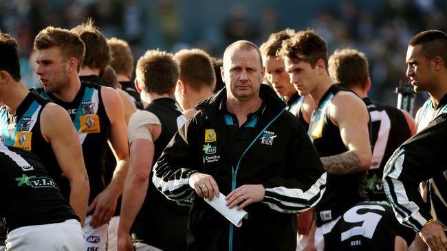 Hinkley coaching against his old club, Geelong, in 2013.