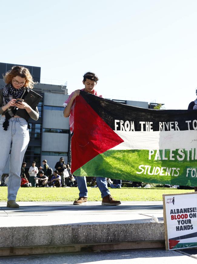 A photo of a protest at the university.