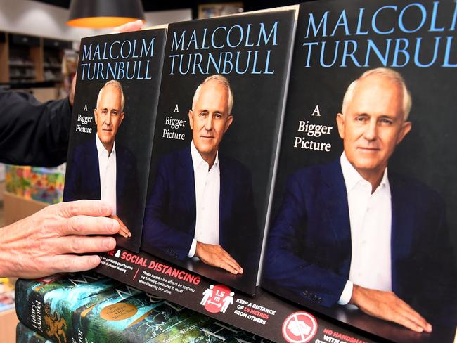 Copies of former Australian prime minister Malcolm Turnbull autobiography are placed on the shelf after it's Australian release in Melbourne on April 20, 2020. - Critical of current prime minister Scott Morrison, the memoir was released early after pirated copies found their way into the hands of politicians and media with the publisher sending a cease and desist notice to a top aide in Morrison's office alleging a massive breach of intellectual property had been committed. (Photo by William WEST / AFP)