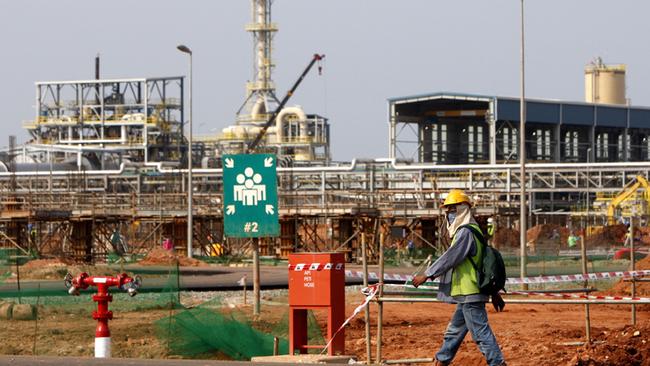 A worker walks past the site of Lynas rare earths plant under construction in Gebeng, eastern Malaysia in 2012. Picture: AP