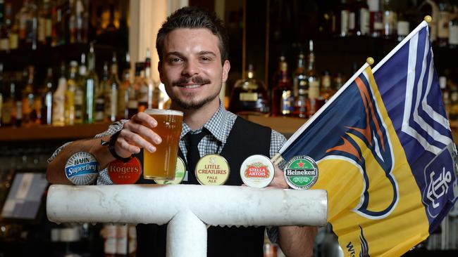 Perth footy hub Subiaco Hotel is expecting a very busy weekend for next week's back-to-back AFL finals. Photo by Daniel Wilkins. PICTURED - Vedran Yaksich, bar tender at The Subiaco Hotel