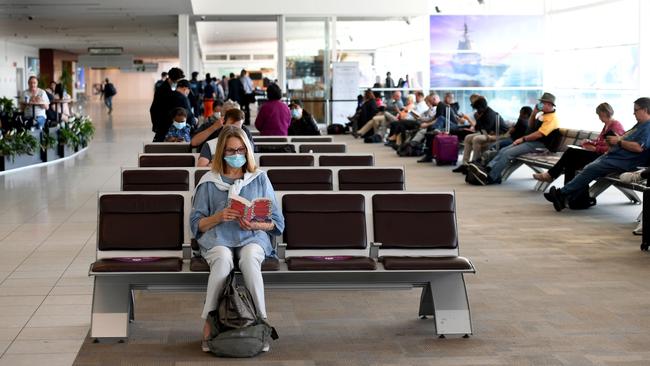 Passengers await their flight at Adelaide airport. Picture: Tricia Watkinson