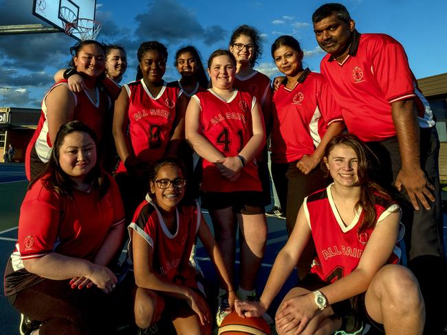 Members of the All Saints basketball team pose for a photo at Roxburgh Park on Tuesday 25 July 2017. The All Saints basketball team has been nominated for a sporting spirit award for their teamwork and commitment to the sport. Photo Luis Enrique Ascui