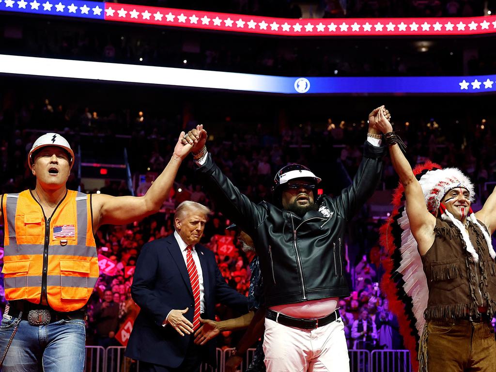 President-elect Donald Trump greets the Village People on stage at his victory rally on January 19. Picture: Anna Moneymaker/Getty Images/AFP