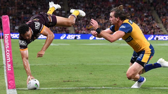 Xavier Coates scores a spectacular try against the Eels. Picture: Bradley Kanaris/Getty Images