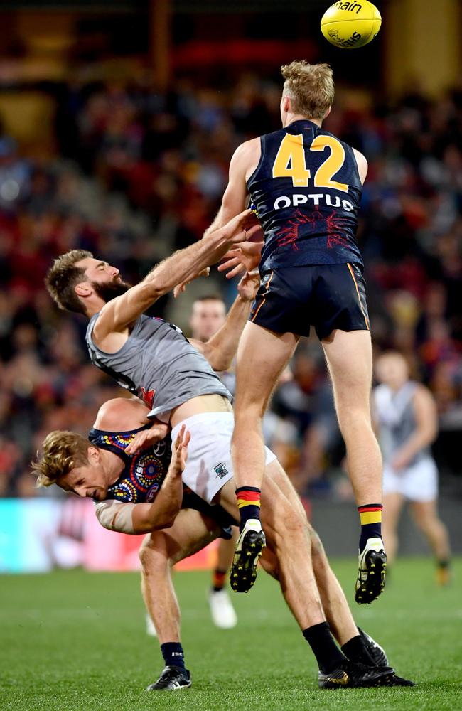 ‘The Moment on Monday’: Westhoff is crunched by Rory Sloane and Alex Keath which stopped a goal in the third quarter. Picture: Mark Brake (Getty).