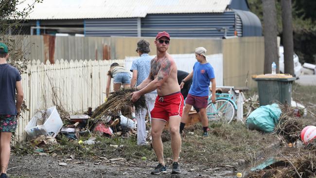 Cleaning up in Vincent St, Auchenflower. Picture: Annette Dew