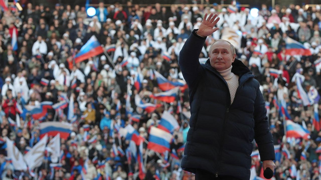 Vladimir Putin attends a concert marking the eighth anniversary of Russia’s annexation of Crimea at the Luzhniki stadium in Moscow on March 18, 2022. Picture: Mikhail Klimentyev/Sputnik/AFP