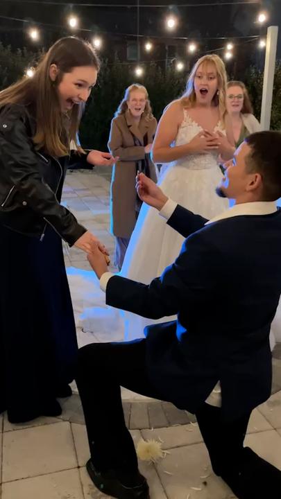 Surprise proposal steals the show during wedding