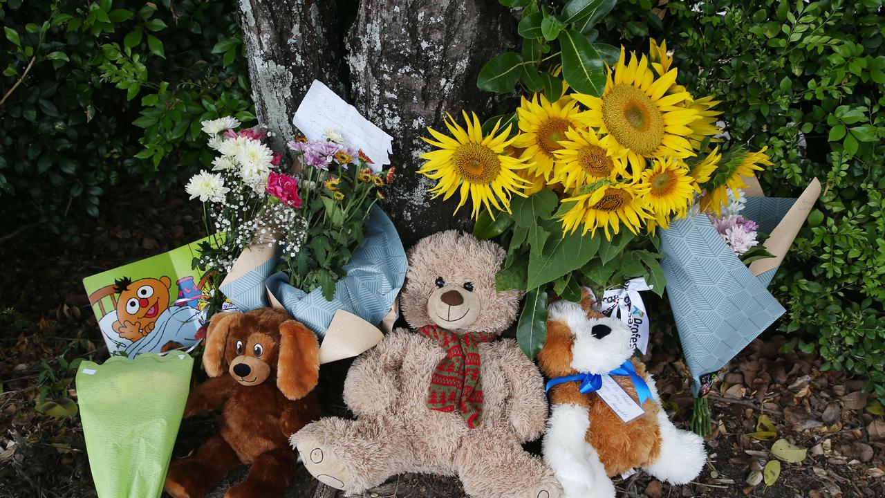 Members of the public left flowers and teddies at the Goodstart Early Learning Centre. Picture: Brendan Radke