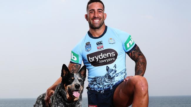 NSW prop Paul Vaughan with Yanga the Blue Healer. Photo: Brett Costello