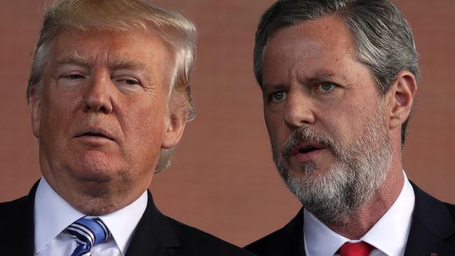 Jerry Falwell (R) and Donald Trump attend a commencement ceremony at Liberty University in Lynchburg, Virginia. Picture: AFP.