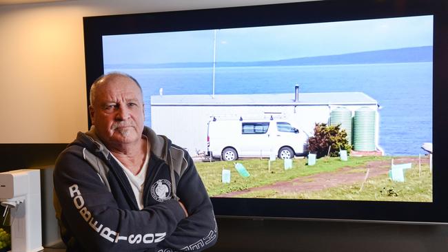 July 7, 2022: Barry Robertson with a picture of his shack in Deep Creek PHOTO: Brenton Edwards,