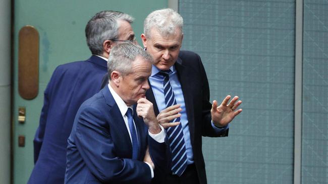 Bill Shorten listens to manager of opposition business Tony Burke during question time. Picture: Gary Ramage